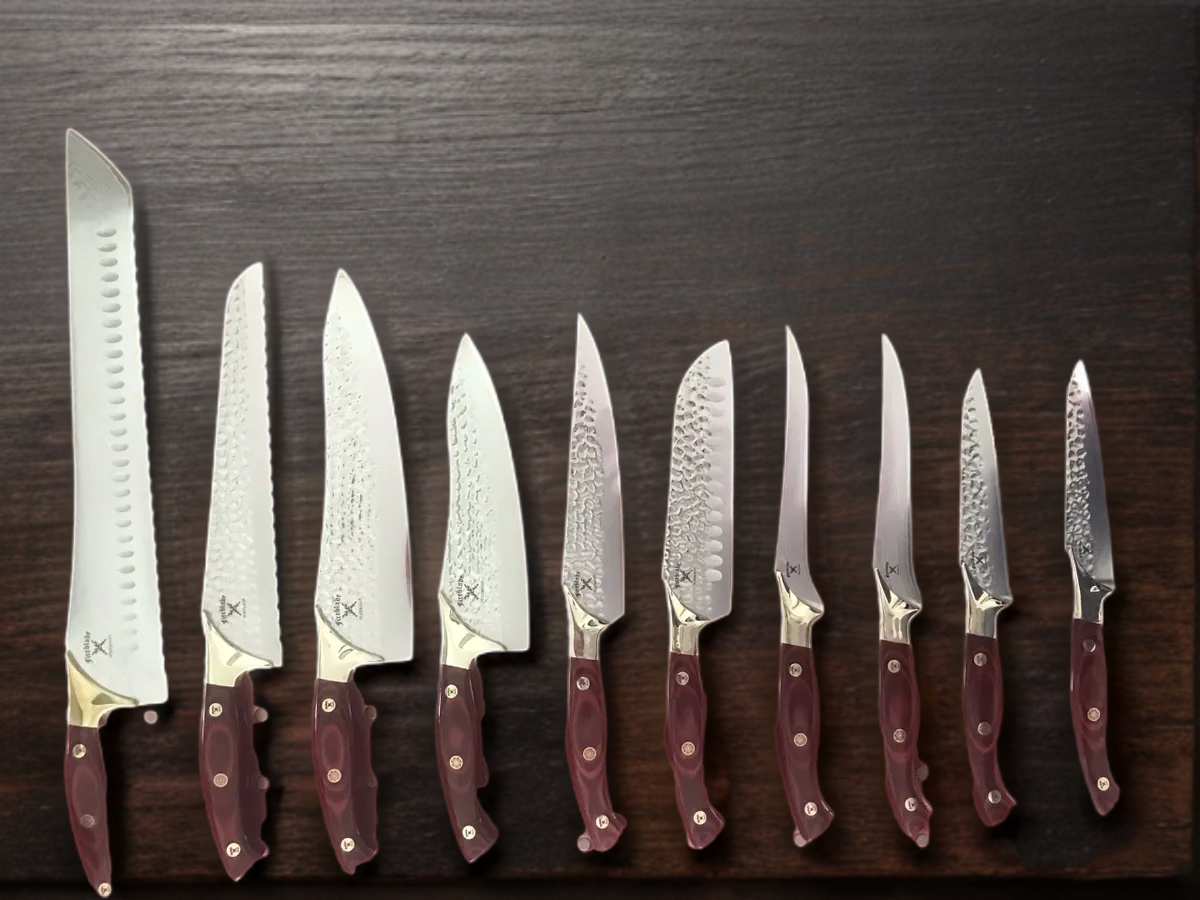 10 Knives Cherry Red Handles plus Matching Red Leather Knife Roll & Tools
